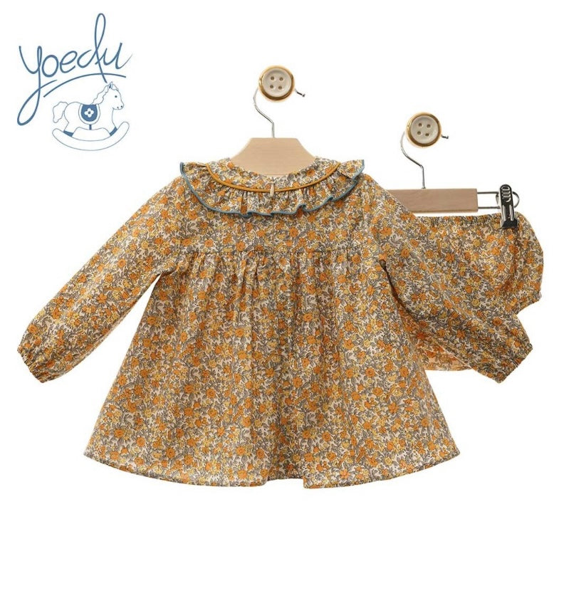 Jesusito amarillo con flores y pompón Yoedu